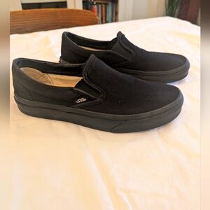 Vans black slip-ons, size 8